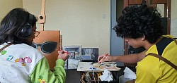 Carlos and Kenzo at work.