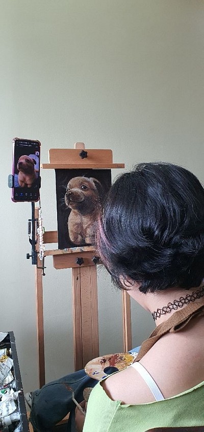 Working on her 2nd painting.