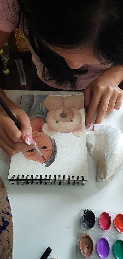 Andie at work / watercolor.