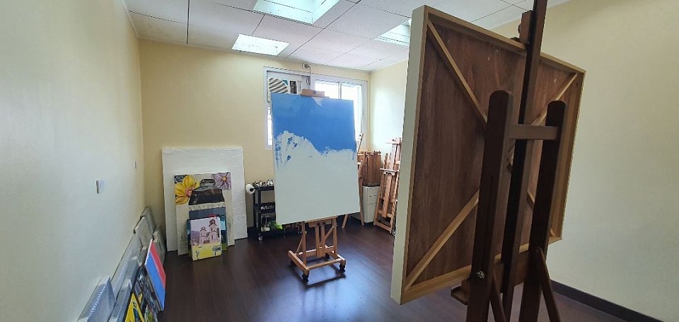 Students work in a calm and focused studio environment.